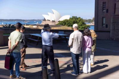 Half Day Sydney Sightseeing Tour - The Rocks & Bondi Beach - Walking The Rocks the right way: convict-era stops and Cadman’s Cottage