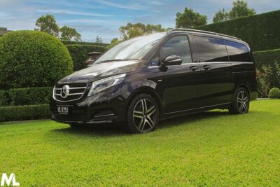 Luxury Mini Bus - Sydney Airport Transfers - Meeting your chauffeur: the text message handoff inside Sydney Airport