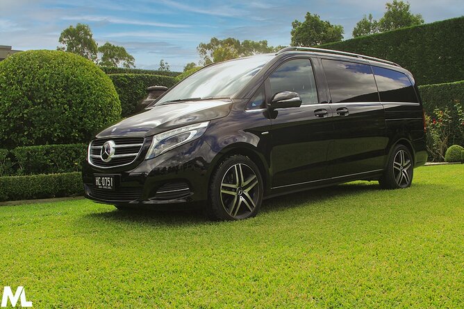 Luxury Mini Bus - Sydney Airport Transfers - Meeting your chauffeur: the text message handoff inside Sydney Airport