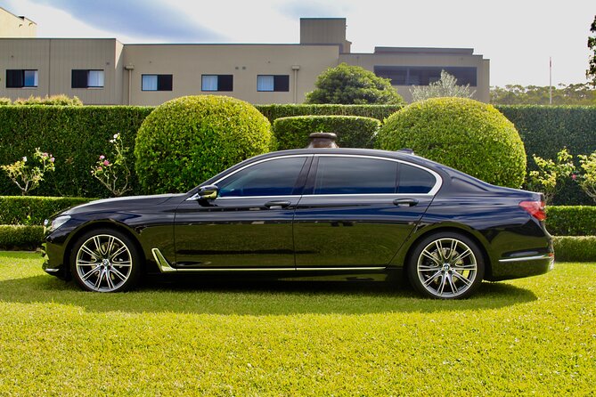 Luxury Van - Sydney Airport Private Departure Transfer - Pickup That Runs Like a System: text message meet-up + luggage help