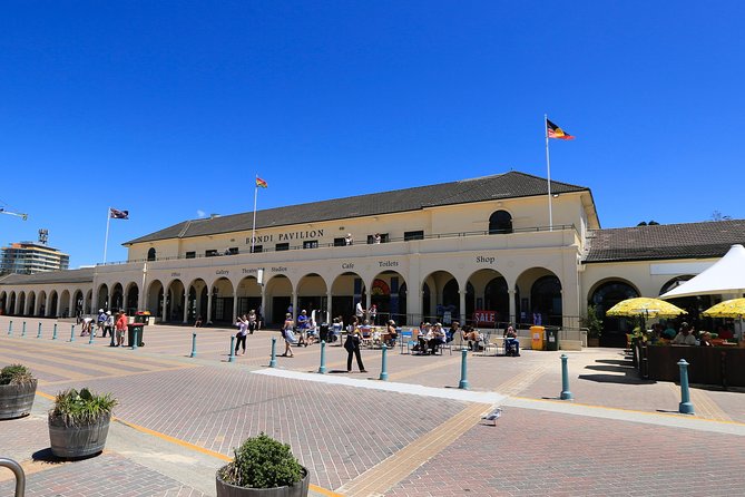 Sydney Coastal Escape | Private Mercedes Tour Sydney - Milsons Point views: Opera House, Bridge, and the north harbour angle