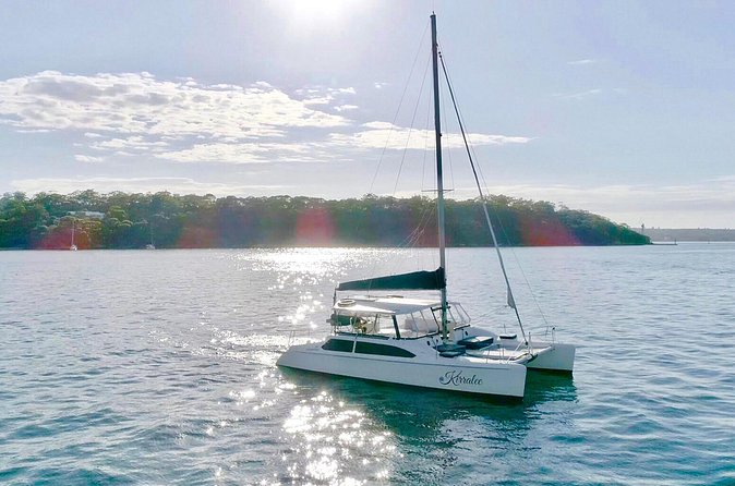 Sydney Harbour BYO New Year's Eve Catamaran Cruise - The Kirralee crew touch: Phil and Justin, plus a steady watch