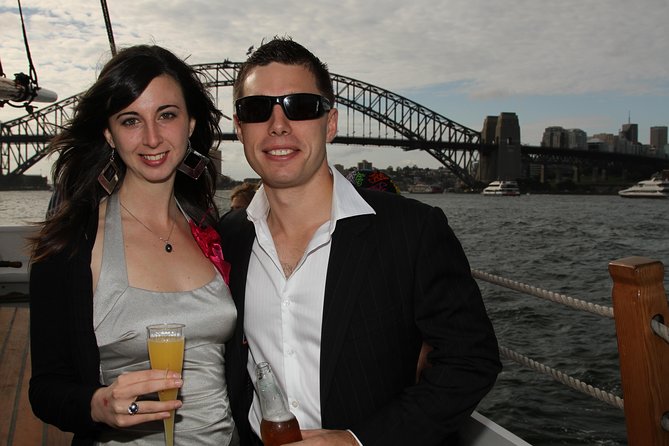 Sydney Harbour Tall Ship Wine & Canapes Evening Cruise - Sydney Harbour Bridge and Opera House at dusk